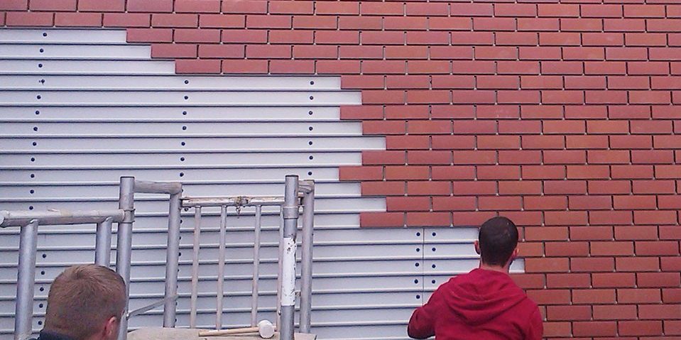 Installation of Corium brick cladding facade 