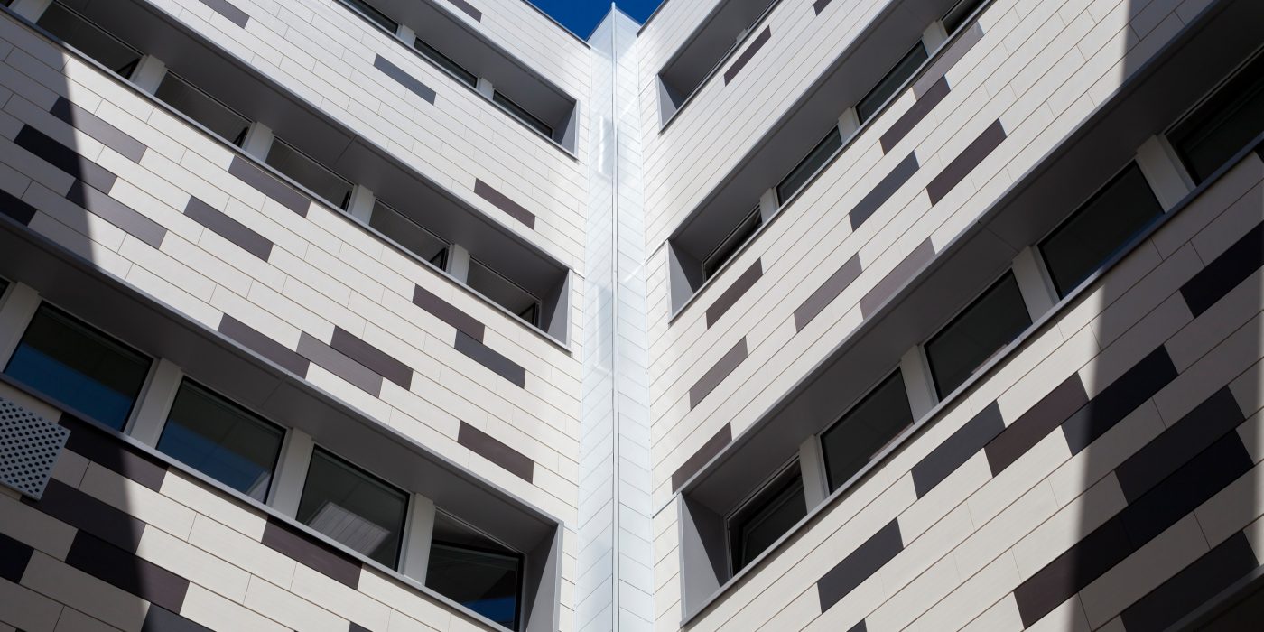 Plublic space with 4 levels. Rue Nationale 59000 Lille. Products Argelite tints  blanc carrare, gris basalte, gris métal.